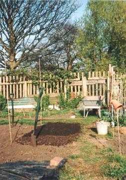 Nice nature photo of robin perching on white plastic bucket
    (still some available free from the shop!).